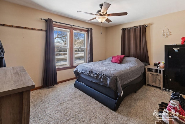 bedroom with ceiling fan and light colored carpet