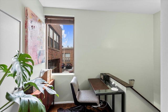 home office featuring hardwood / wood-style floors