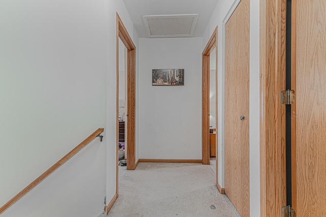 hallway with light carpet