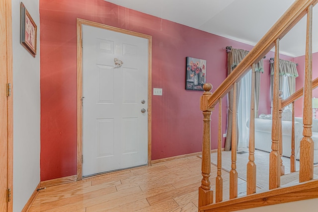 foyer with light hardwood / wood-style flooring