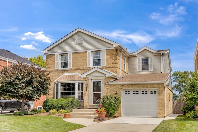 traditional-style home featuring driveway, roof with shingles, an attached garage, a front lawn, and brick siding