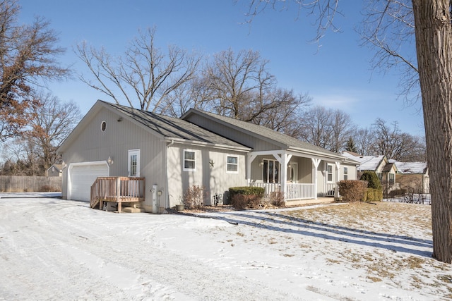 view of front facade featuring a garage and a porch