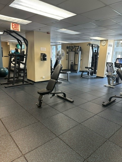 gym with a drop ceiling