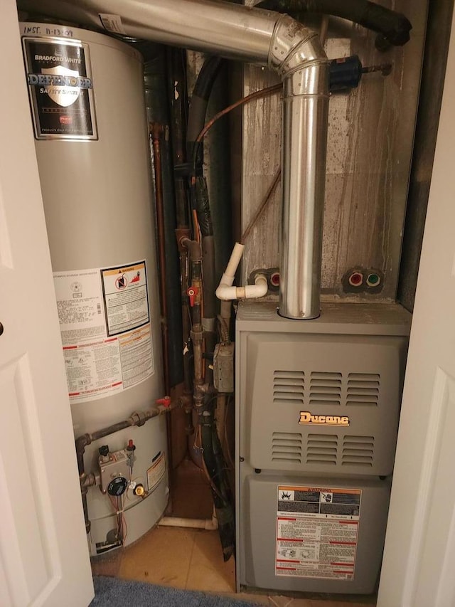 utilities featuring gas water heater and heating unit