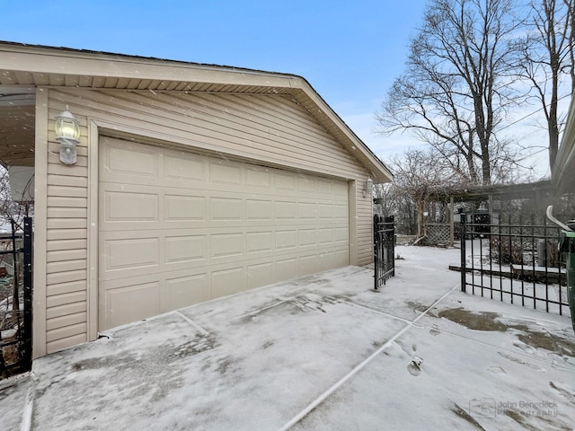 view of snow covered garage