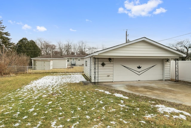 garage featuring a yard