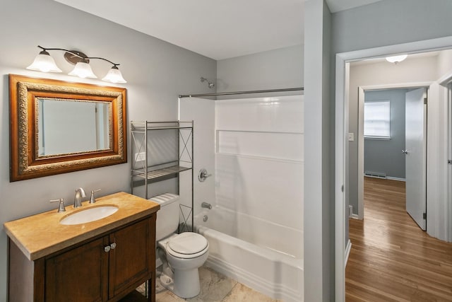 full bathroom with shower / washtub combination, toilet, and vanity