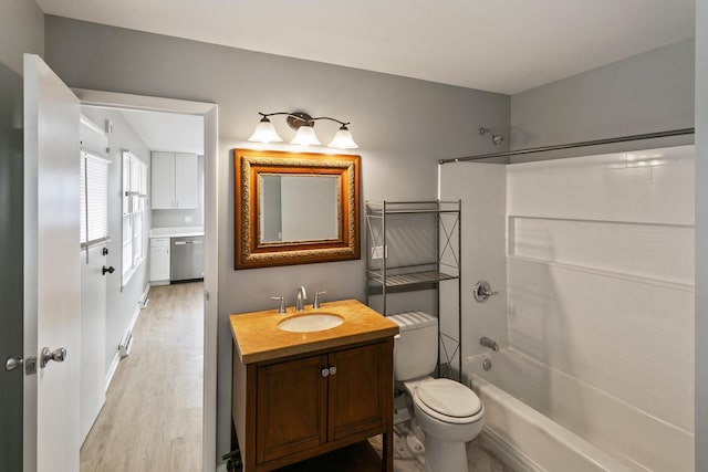 full bathroom with vanity, toilet, bathing tub / shower combination, and wood-type flooring