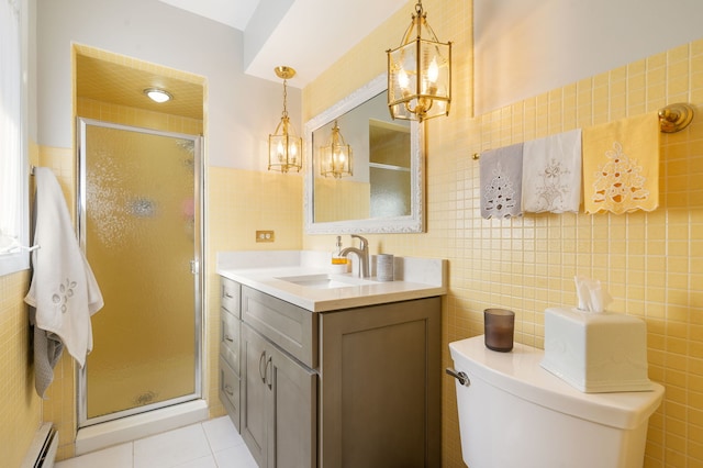 bathroom featuring a baseboard heating unit, tile walls, toilet, walk in shower, and vanity