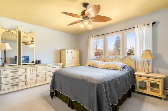 bedroom featuring ceiling fan and carpet flooring