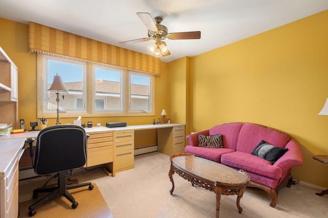 carpeted office featuring ceiling fan and baseboard heating