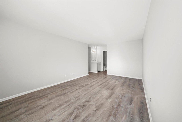 empty room featuring hardwood / wood-style flooring