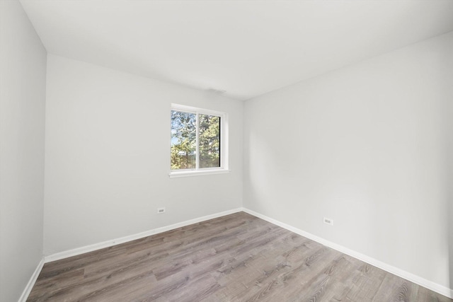 empty room featuring hardwood / wood-style floors