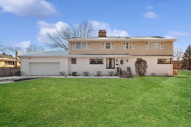 back of house featuring a lawn, fence, concrete driveway, an attached garage, and a chimney