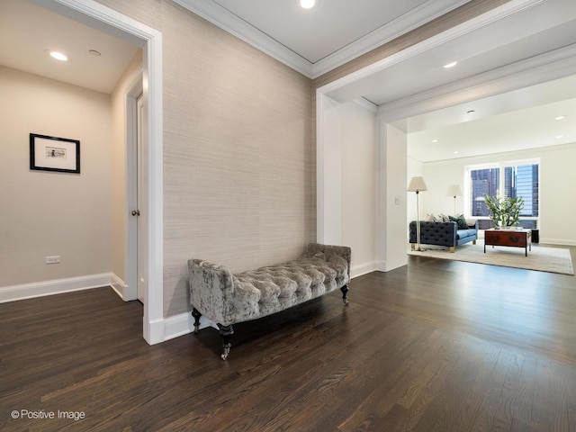 hallway featuring dark hardwood / wood-style floors and crown molding