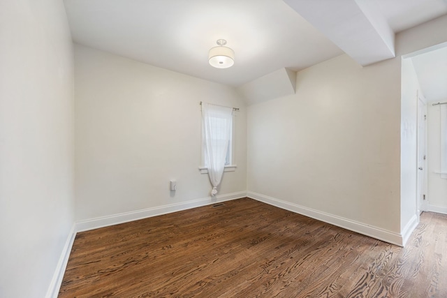 spare room featuring hardwood / wood-style floors