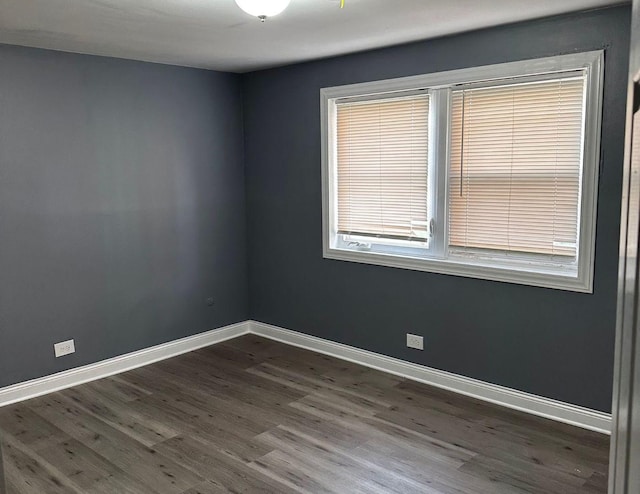 empty room featuring hardwood / wood-style flooring