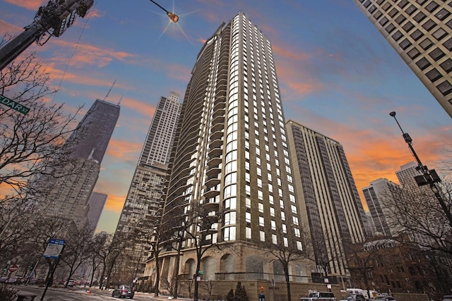 view of outdoor building at dusk