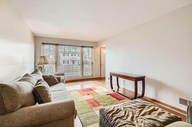 living room featuring light wood-type flooring