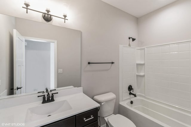 full bathroom with vanity,  shower combination, and toilet