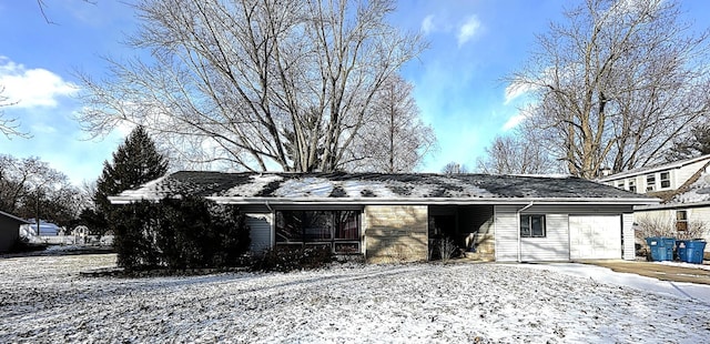 single story home with a garage