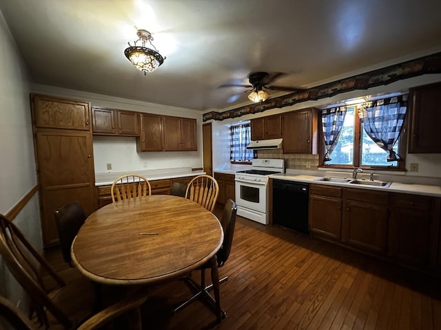 kitchen with plenty of natural light, sink, dishwasher, and white gas range oven