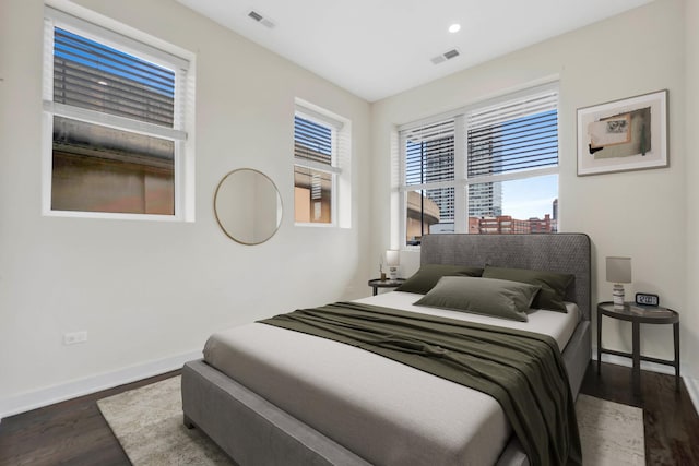 bedroom featuring dark wood-type flooring