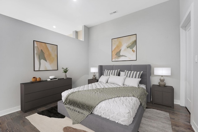 bedroom featuring dark hardwood / wood-style floors