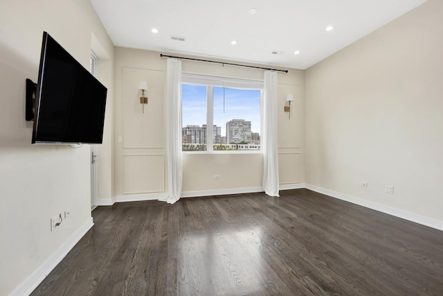 interior space with dark hardwood / wood-style floors