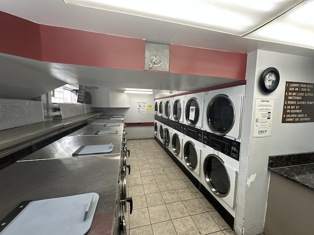 7337 S S Shore Dr Unit 503, Chicago, IL 60649 - common laundry area with light tile patterned floors and stacked washing maching and dryer