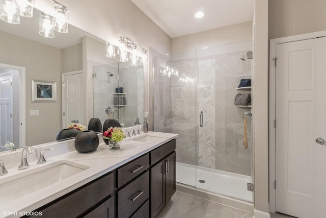 bathroom featuring walk in shower and vanity