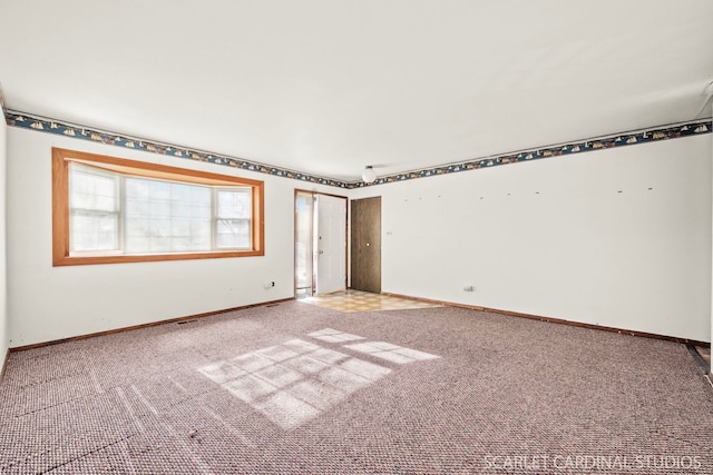 unfurnished bedroom featuring light colored carpet