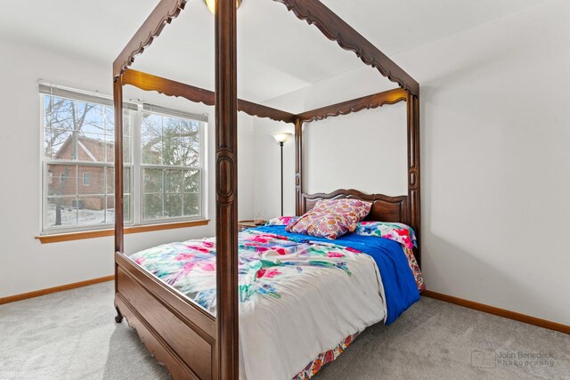 bedroom with light colored carpet