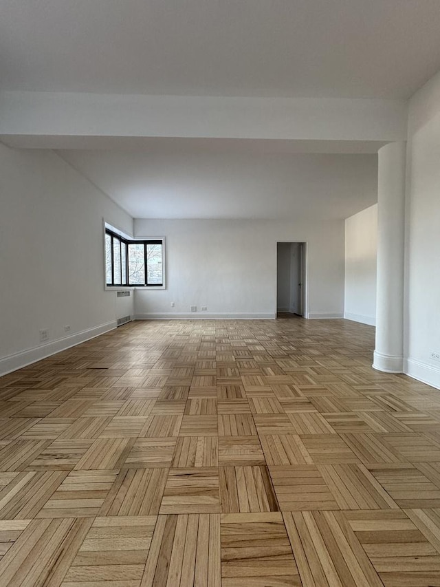 empty room featuring light parquet flooring