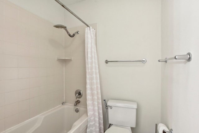 bathroom featuring toilet and shower / bathtub combination with curtain