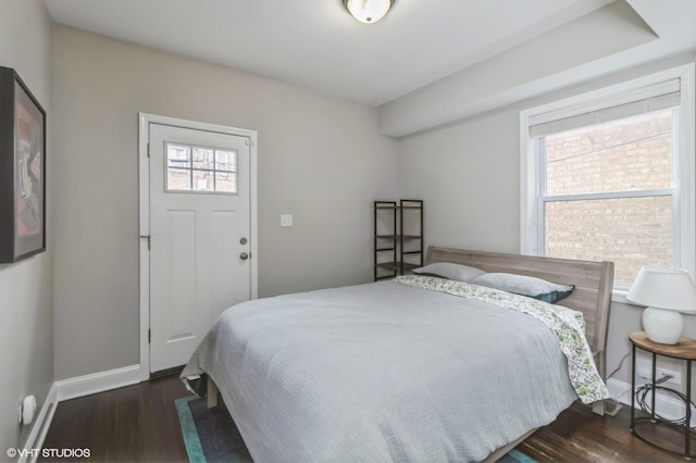 bedroom featuring dark hardwood / wood-style floors