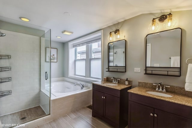 bathroom featuring vanity, tile patterned flooring, and independent shower and bath