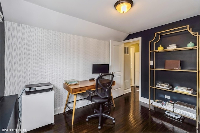 home office with vaulted ceiling and dark wood-type flooring