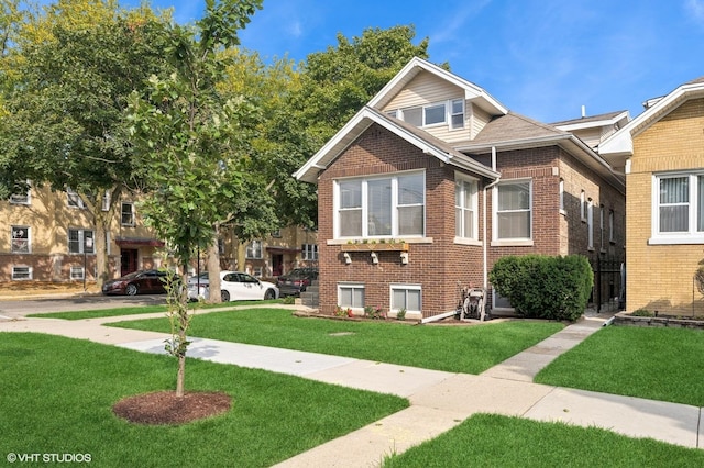 view of front facade with a front lawn