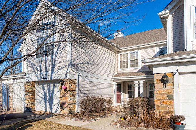 exterior space with a garage