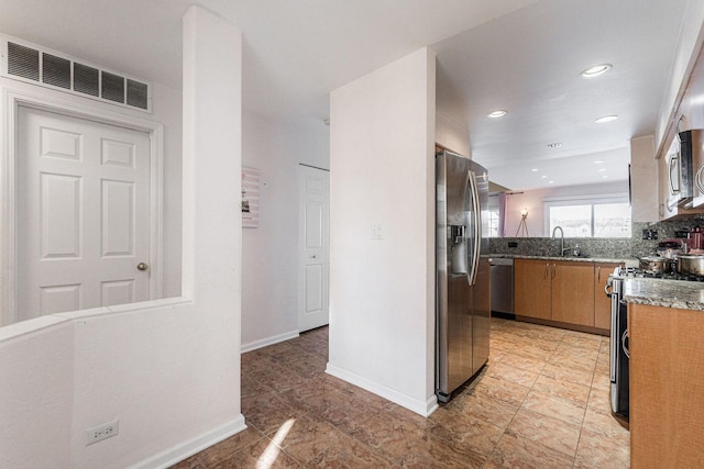 kitchen featuring sink and stainless steel appliances