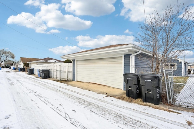 view of snow covered garage