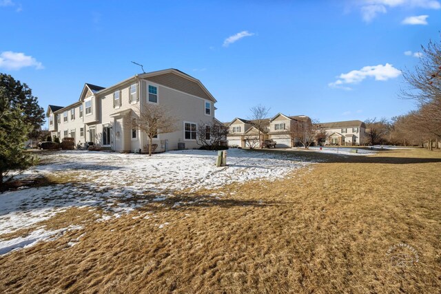 view of snow covered property