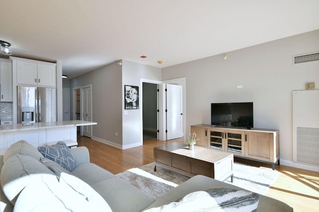 living room featuring light hardwood / wood-style floors