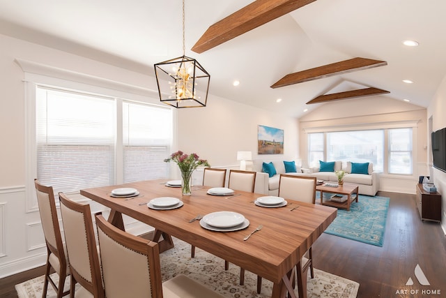 dining room featuring dark hardwood / wood-style floors, lofted ceiling with beams, and a chandelier