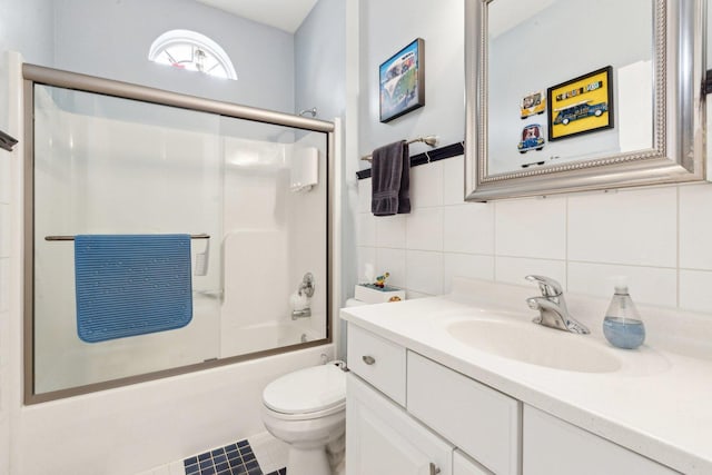 full bath with vanity, enclosed tub / shower combo, backsplash, and toilet