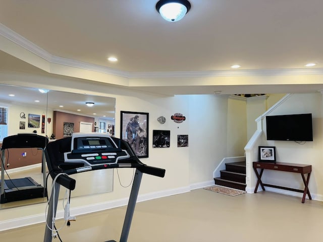 exercise area featuring baseboards, ornamental molding, and recessed lighting