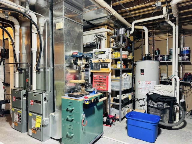 utility room with gas water heater