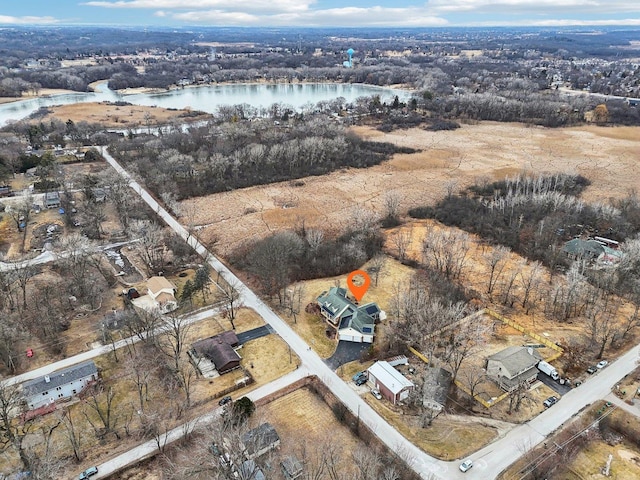 drone / aerial view with a water view