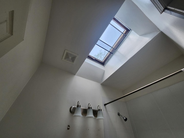 interior space featuring a skylight